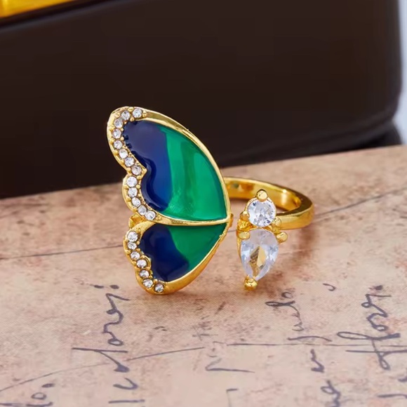 Anthropologie Gold Ring with Blue and White Butterfly Design - Picture 4 of 7